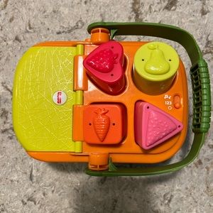 Fisher-Price Kids' Tiny Garden Sort and Learn Picnic Learning Toy